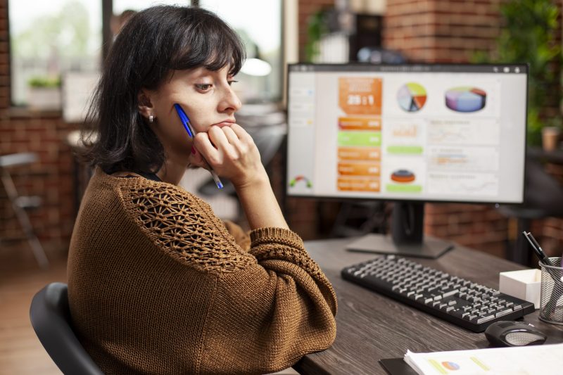 Woman overwhelmed by startup analysis